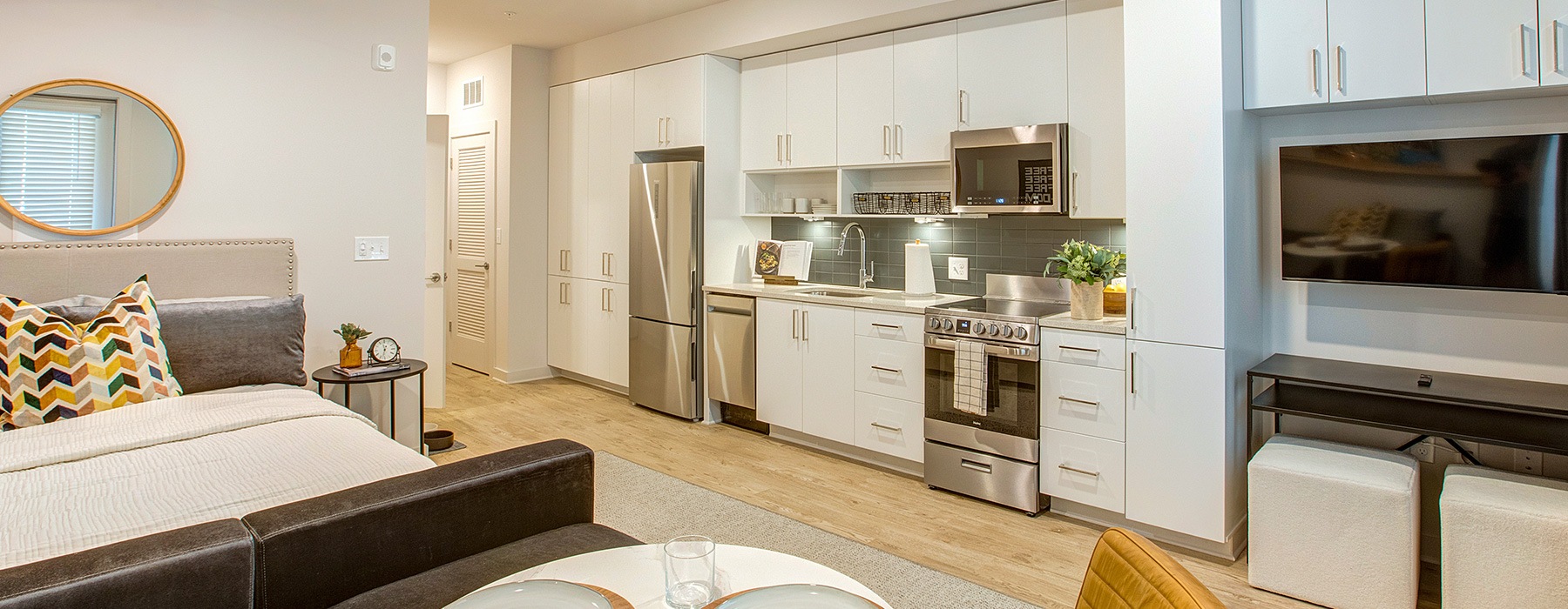 open living concept showing living room and kitchen combined with ample space for seating and modern living room decor